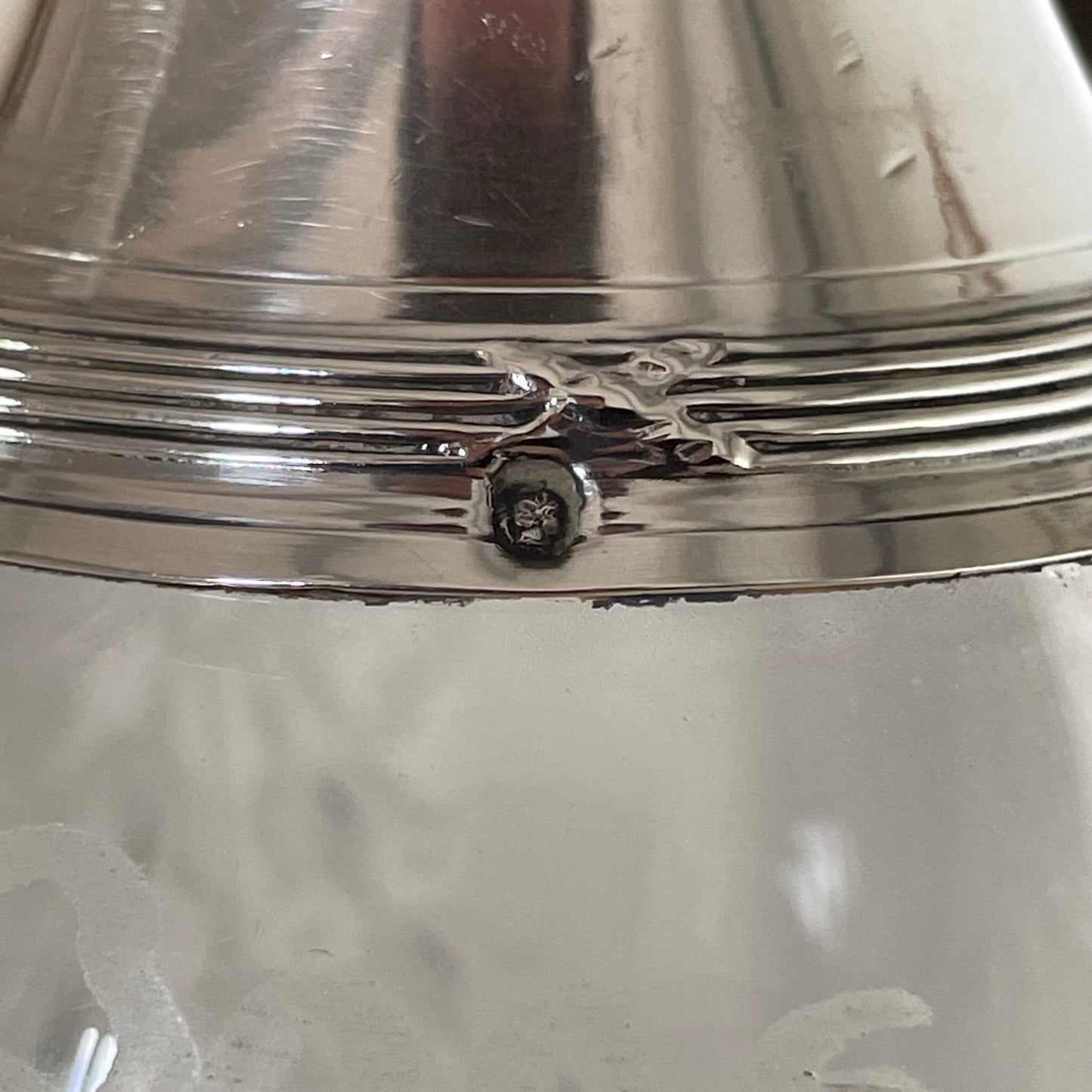 Pair of French silver and crystal carafes with an elegant ribbon motif, adding sophistication and charm to any table setting.