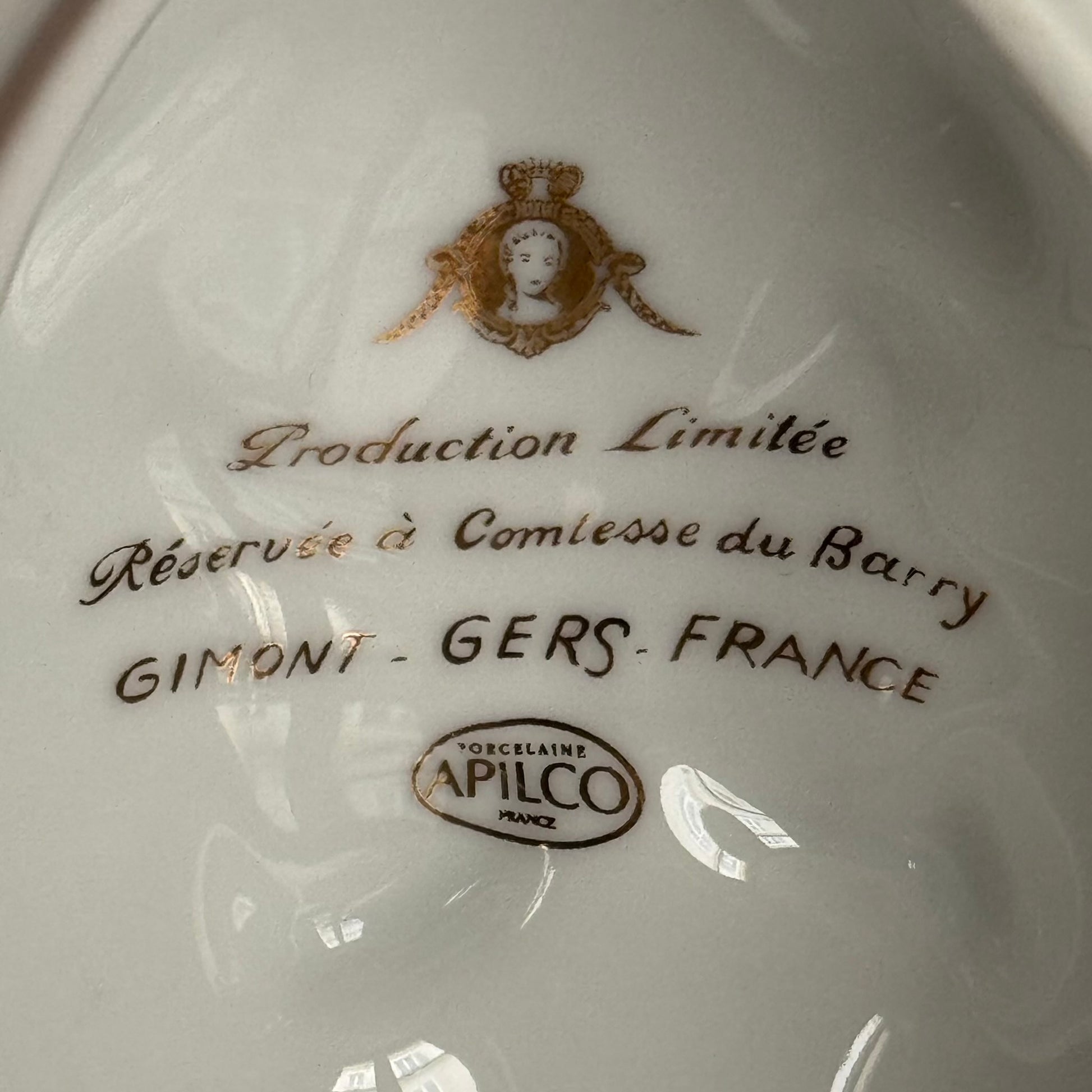 Vintage porcelain egg-shaped box by APILCO, inspired by the 18th-century Sèvres du Barry service. Features ribbon details, floral patterns, and “DB” initials in elegant design