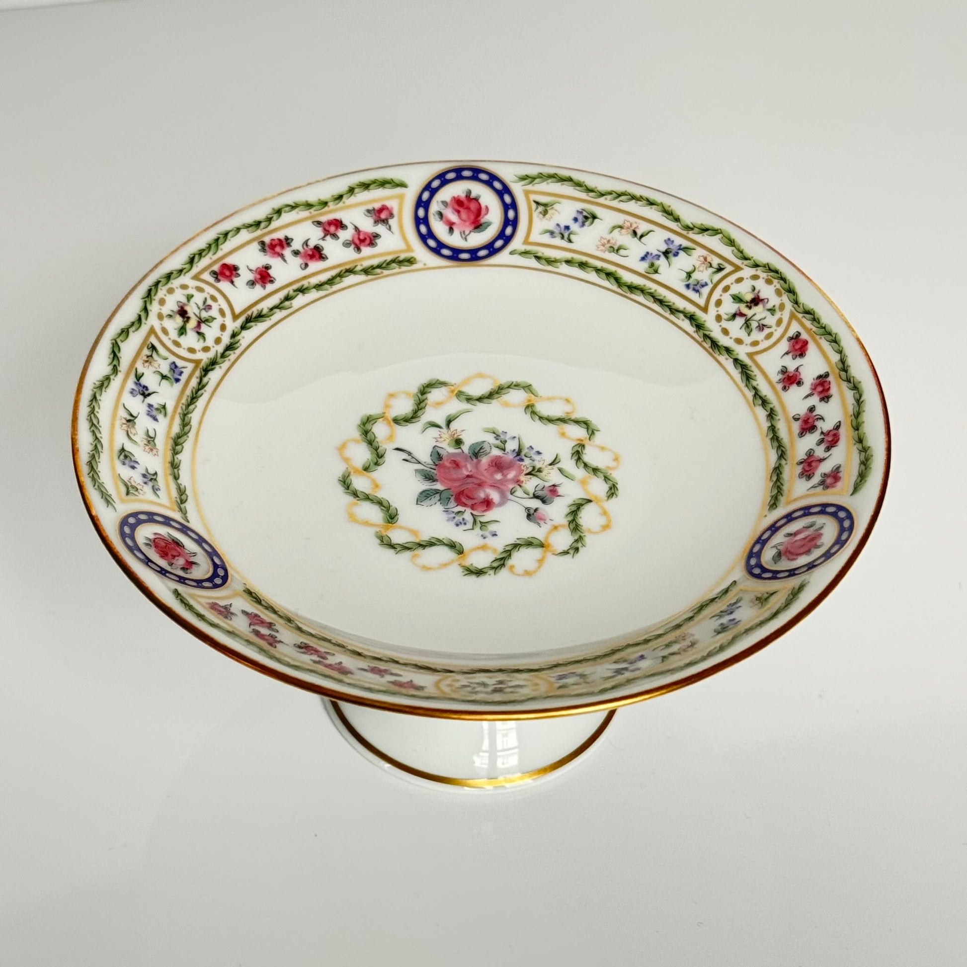 Haviland “Louveciennes” porcelain compote from Limoges, featuring delicate floral and botanical motifs inspired by the 1781 Sèvres service commissioned for Marie-Antoinette.