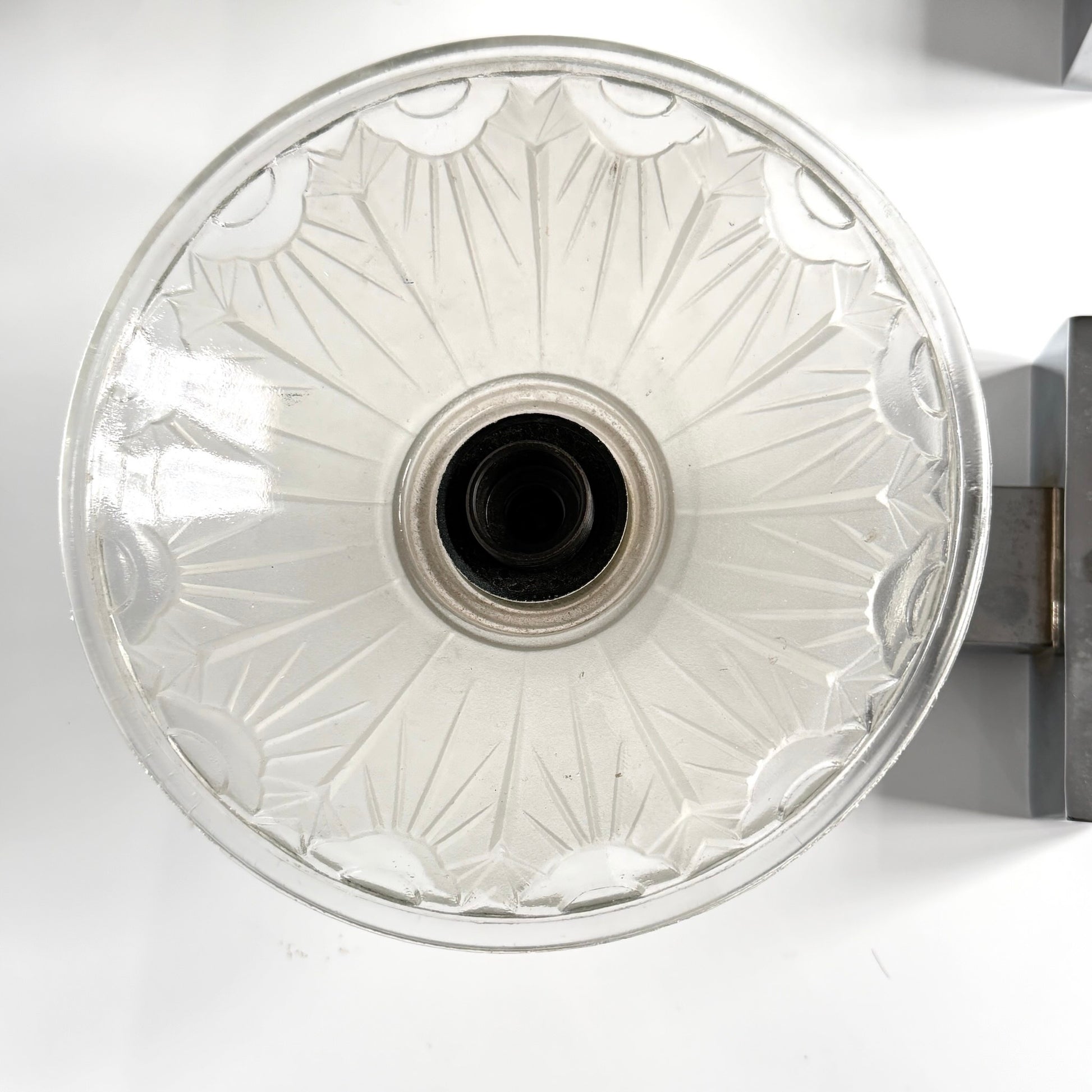 Pair of antique French Art Deco wall sconces, chromed metal and molded glass shades, early 20th century.