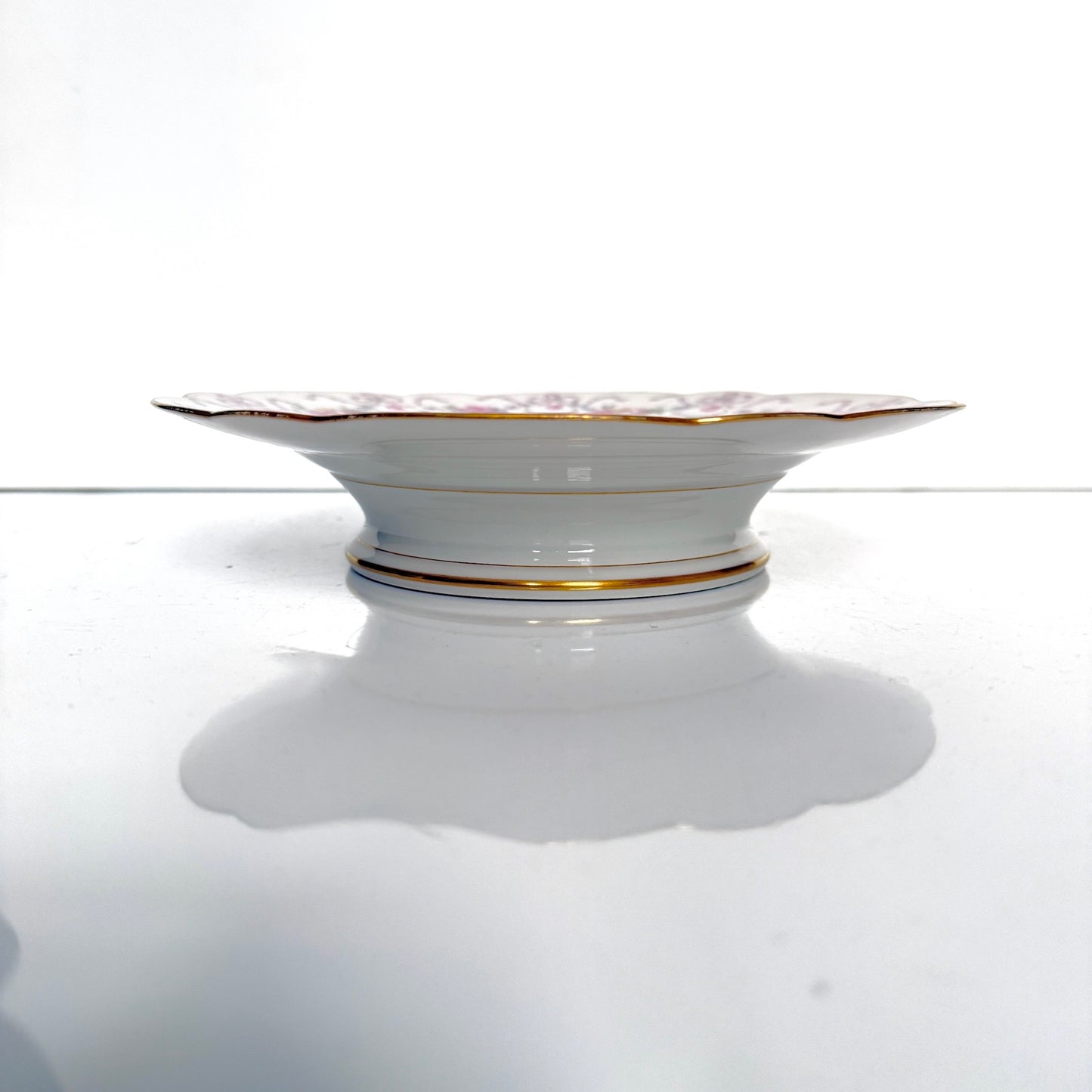 Antique Limoges porcelain footed cake stand, floral garlands and ribbons, D&C Old Bernardaud, late 19th century France.