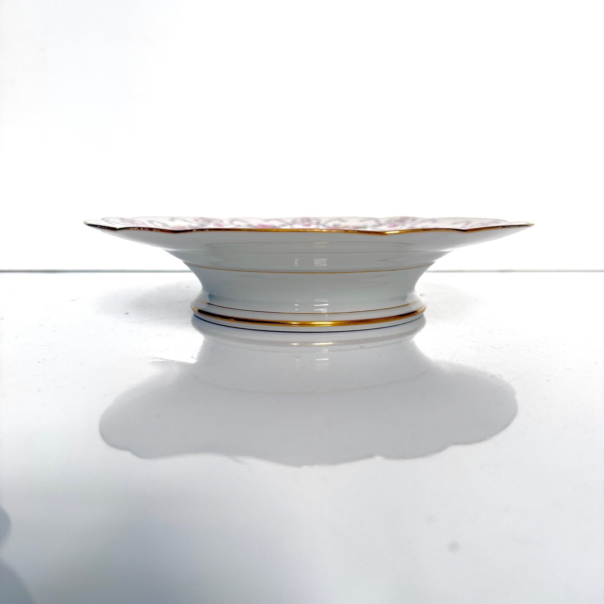 Antique Limoges porcelain footed cake stand, floral garlands and ribbons, D&C Old Bernardaud, late 19th century France.