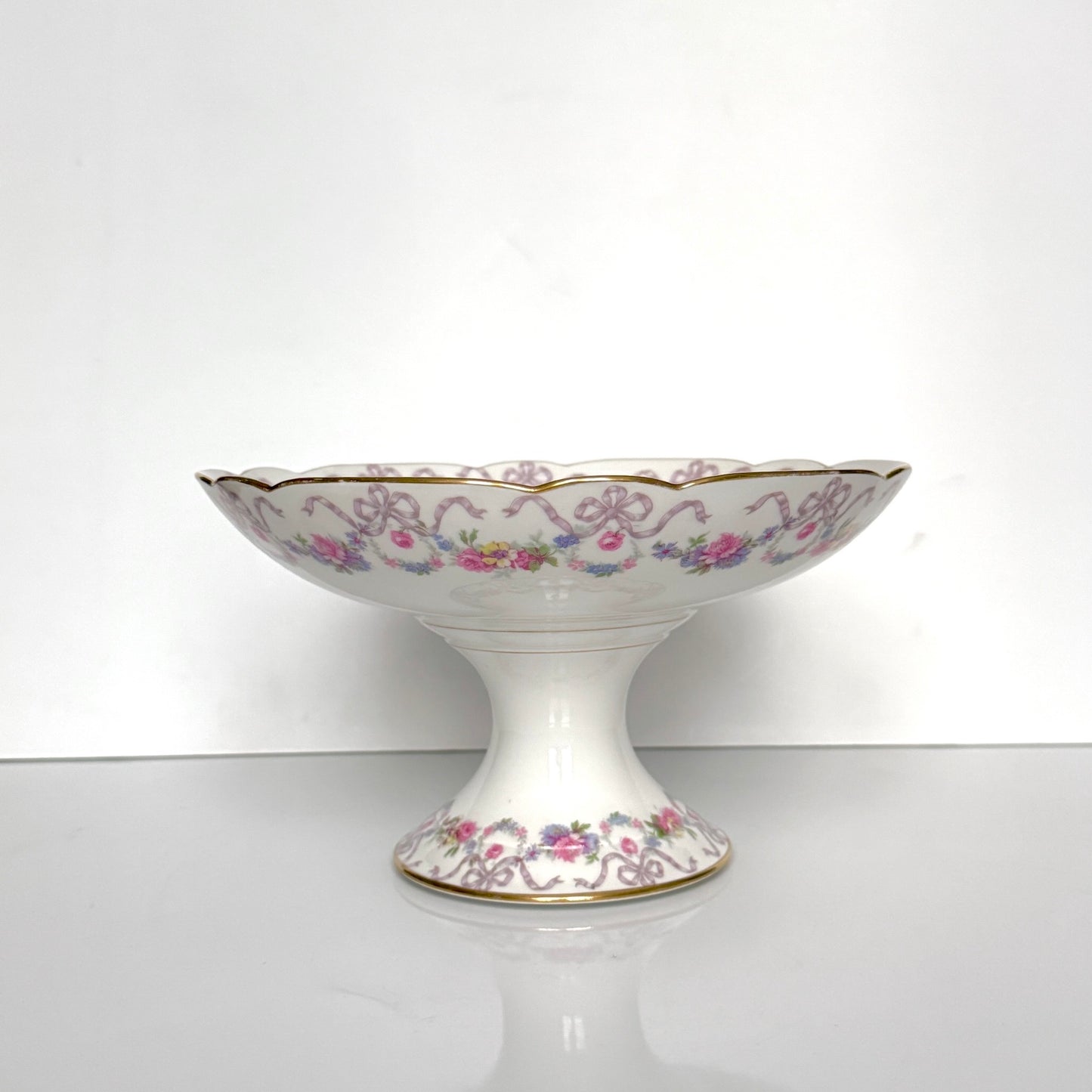 Antique Limoges porcelain footed compote fruit bowl, floral garlands and ribbons, D&C Vieux Bernardaud, late 19th century France.