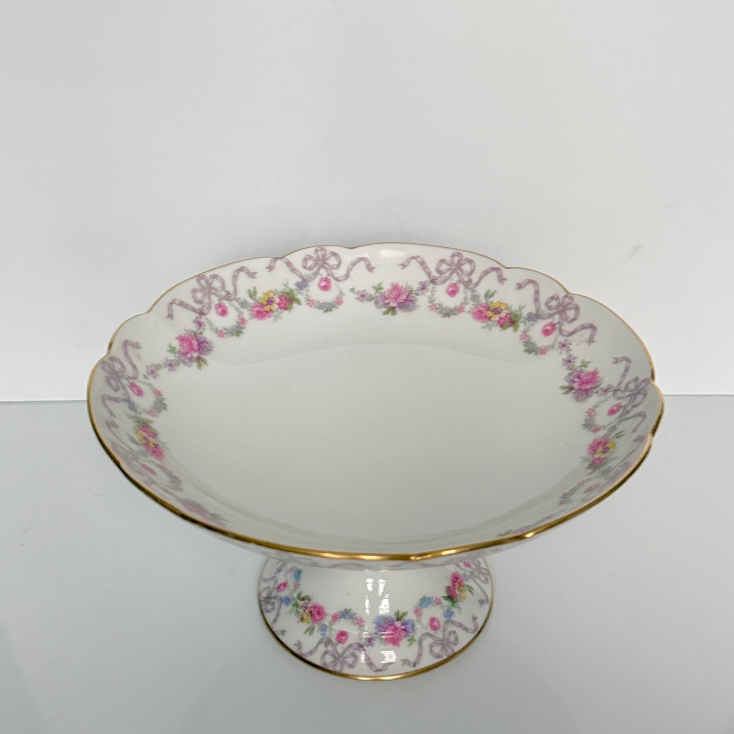 Antique Limoges porcelain footed compote fruit bowl, floral garlands and ribbons, D&C Vieux Bernardaud, late 19th century France.
