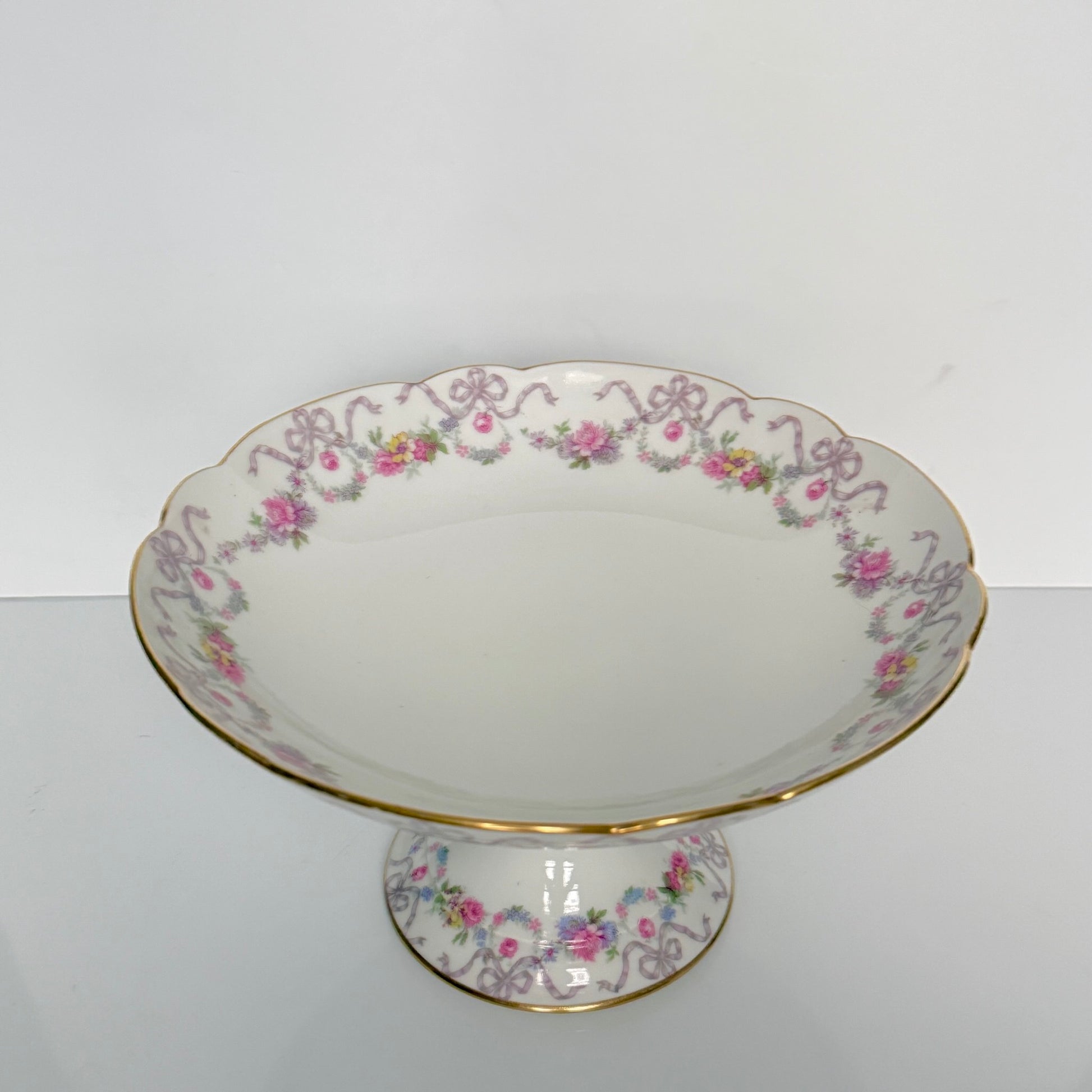 Antique Limoges porcelain footed compote fruit bowl, floral garlands and ribbons, D&C Vieux Bernardaud, late 19th century France.