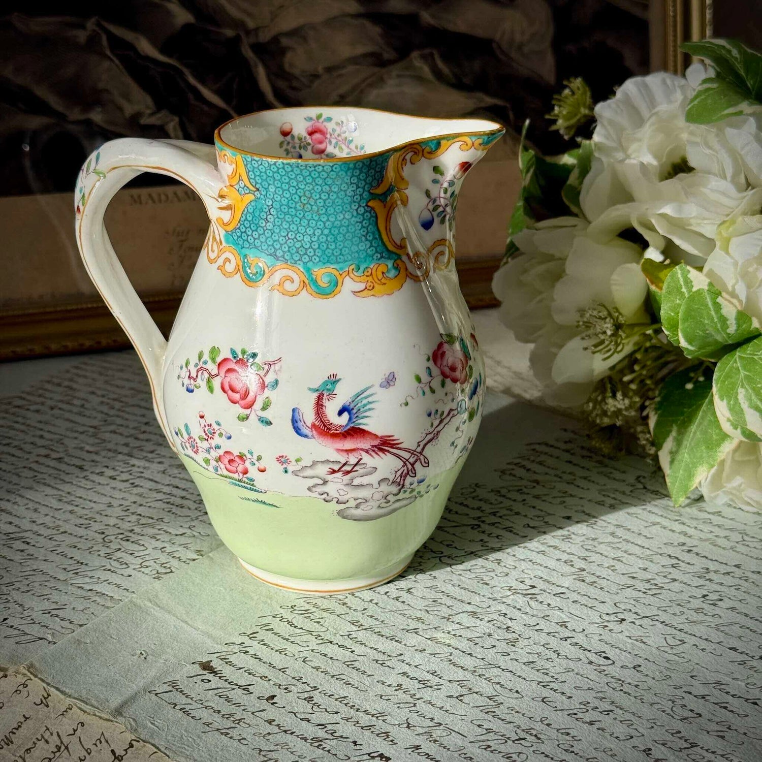 Antique Minton porcelain milk jug, chinoiserie decoration with phoenix and flowers, circa 1880-1890 England.