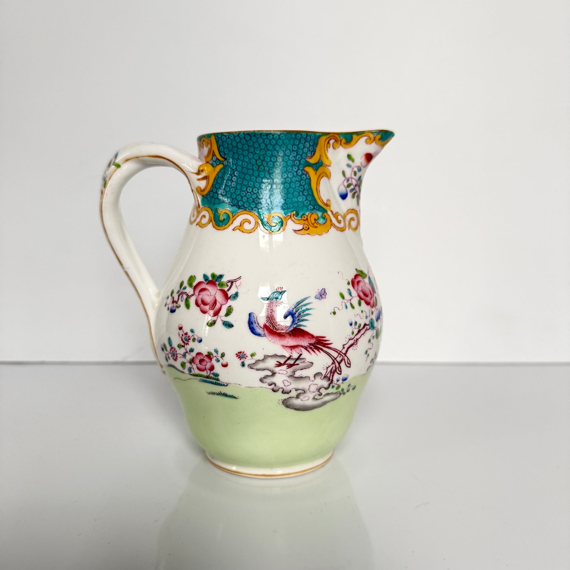 Antique Minton porcelain milk jug, chinoiserie decoration with phoenix and flowers, circa 1880-1890 England.