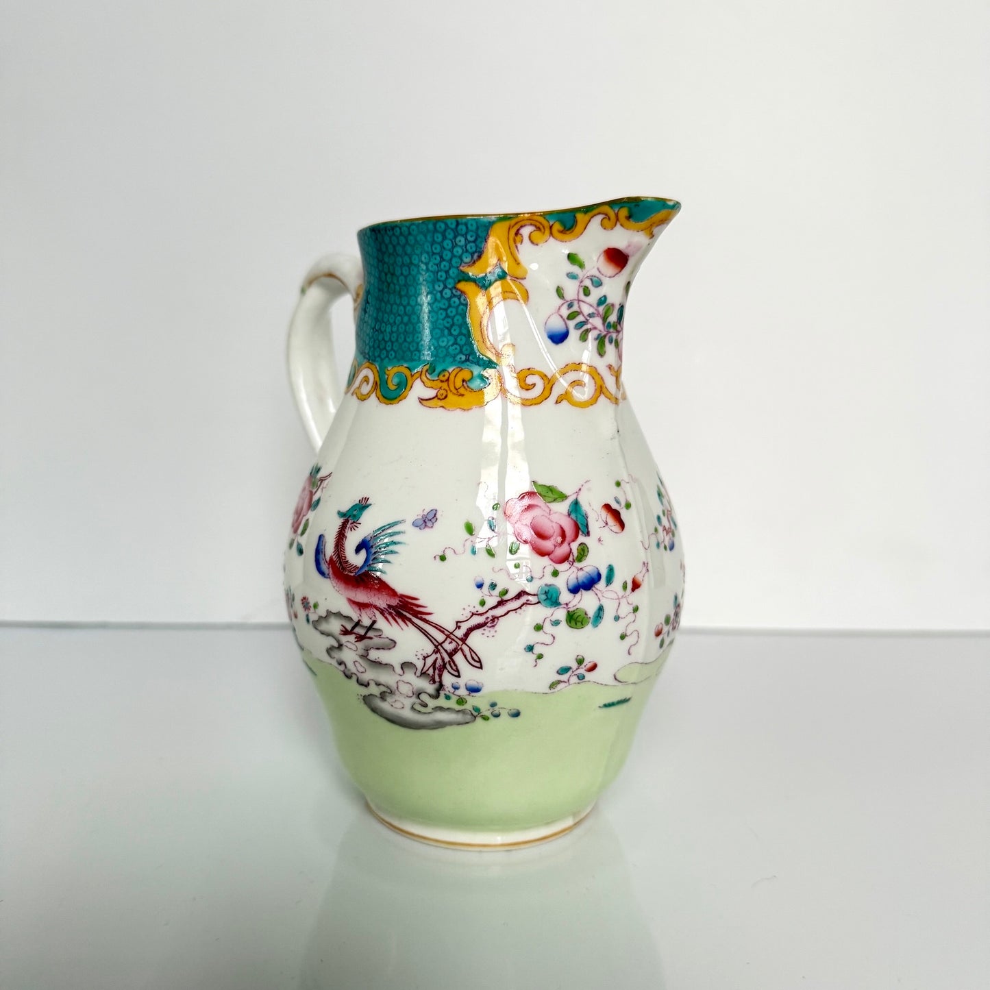 Antique Minton porcelain milk jug, chinoiserie decoration with phoenix and flowers, circa 1880-1890 England.