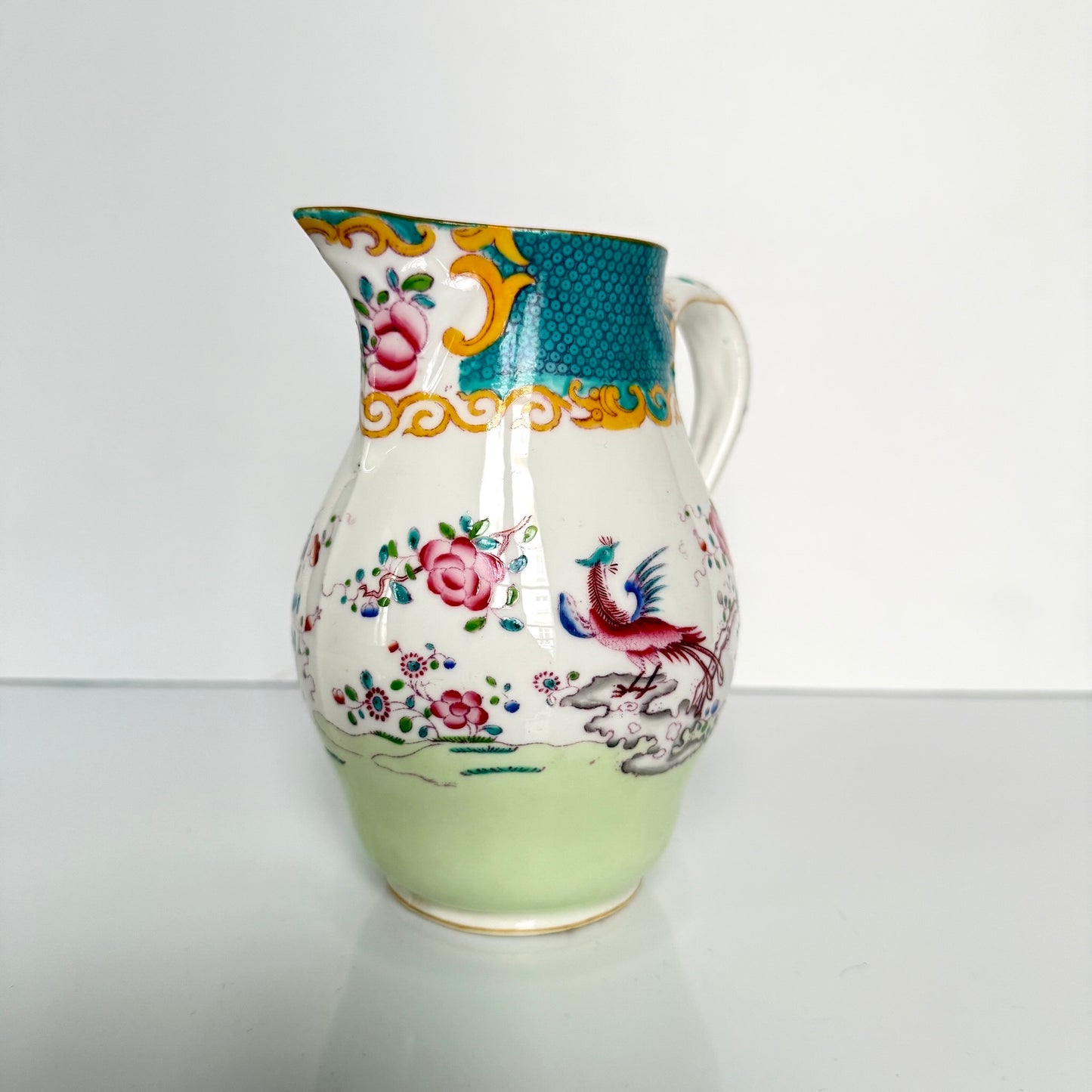 Antique Minton porcelain milk jug, chinoiserie decoration with phoenix and flowers, circa 1880-1890 England.