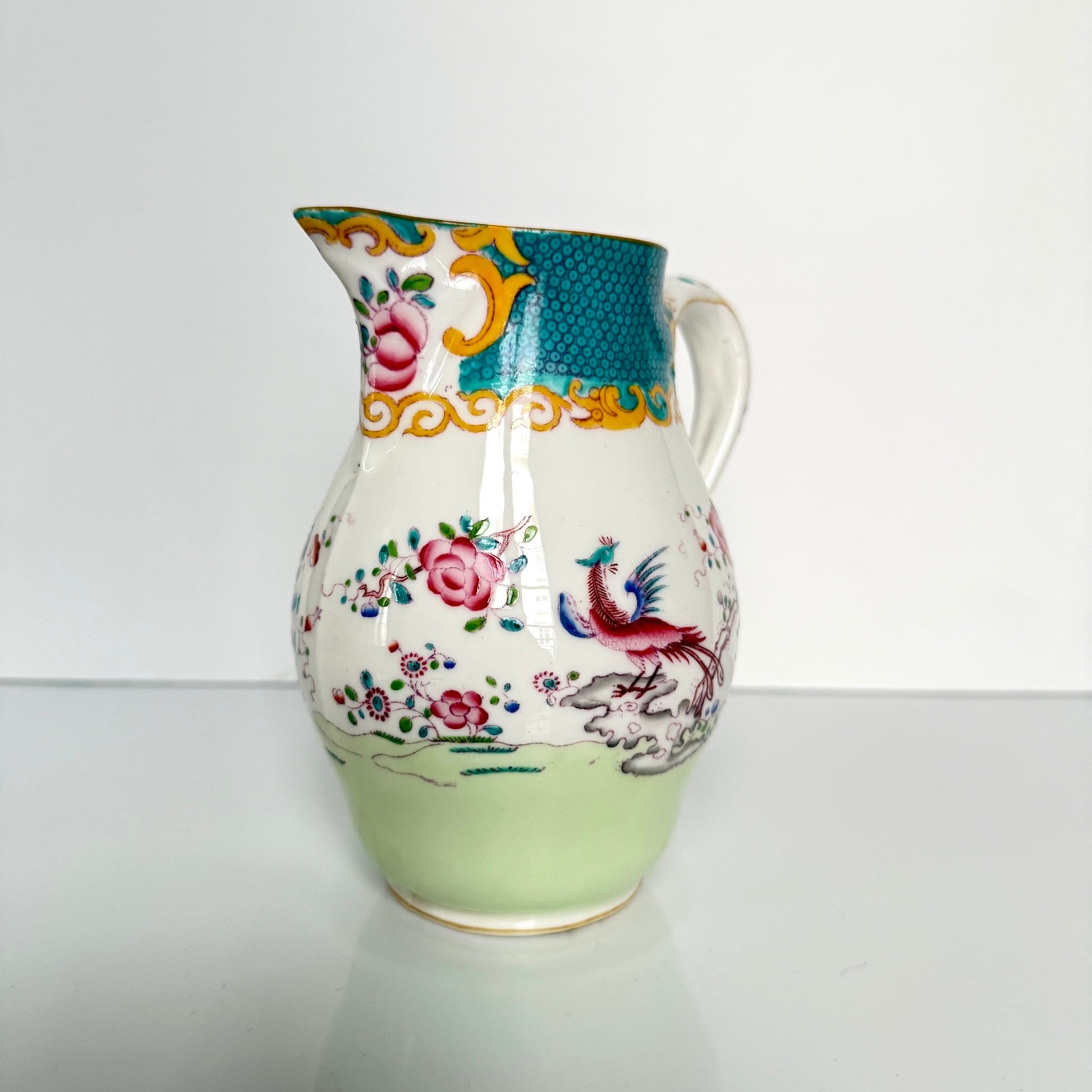 Antique Minton porcelain milk jug, chinoiserie decoration with phoenix and flowers, circa 1880-1890 England.