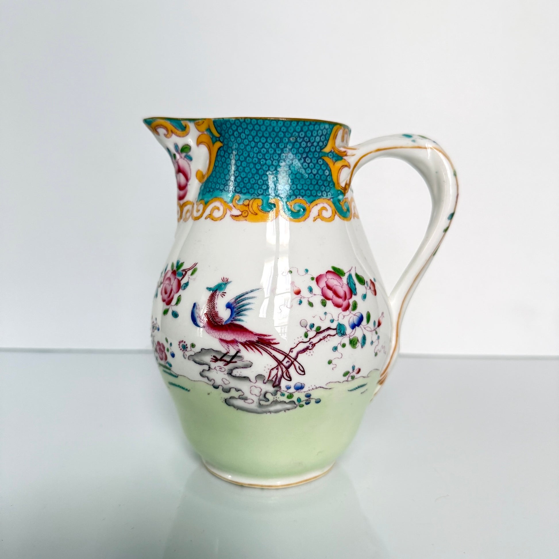 Antique Minton porcelain milk jug, chinoiserie decoration with phoenix and flowers, circa 1880-1890 England.