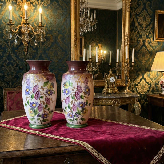 Pair of antique French opaline glass vases with pink and plum gradient, adorned with hand-painted floral motifs and thick gold enamel, 19th century.