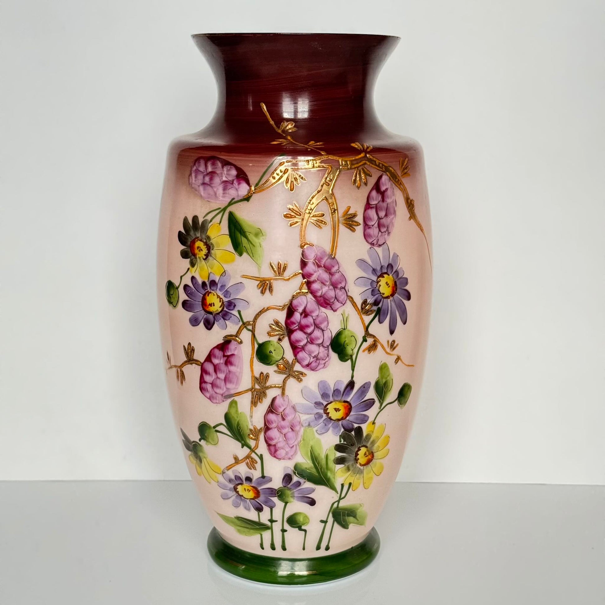 Pair of antique French opaline glass vases with pink and plum gradient, adorned with hand-painted floral motifs and thick gold enamel, 19th century.