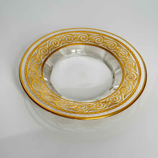 Baccarat crystal vide-poche (trinket dish) featuring a rich gold arabesque border, France.