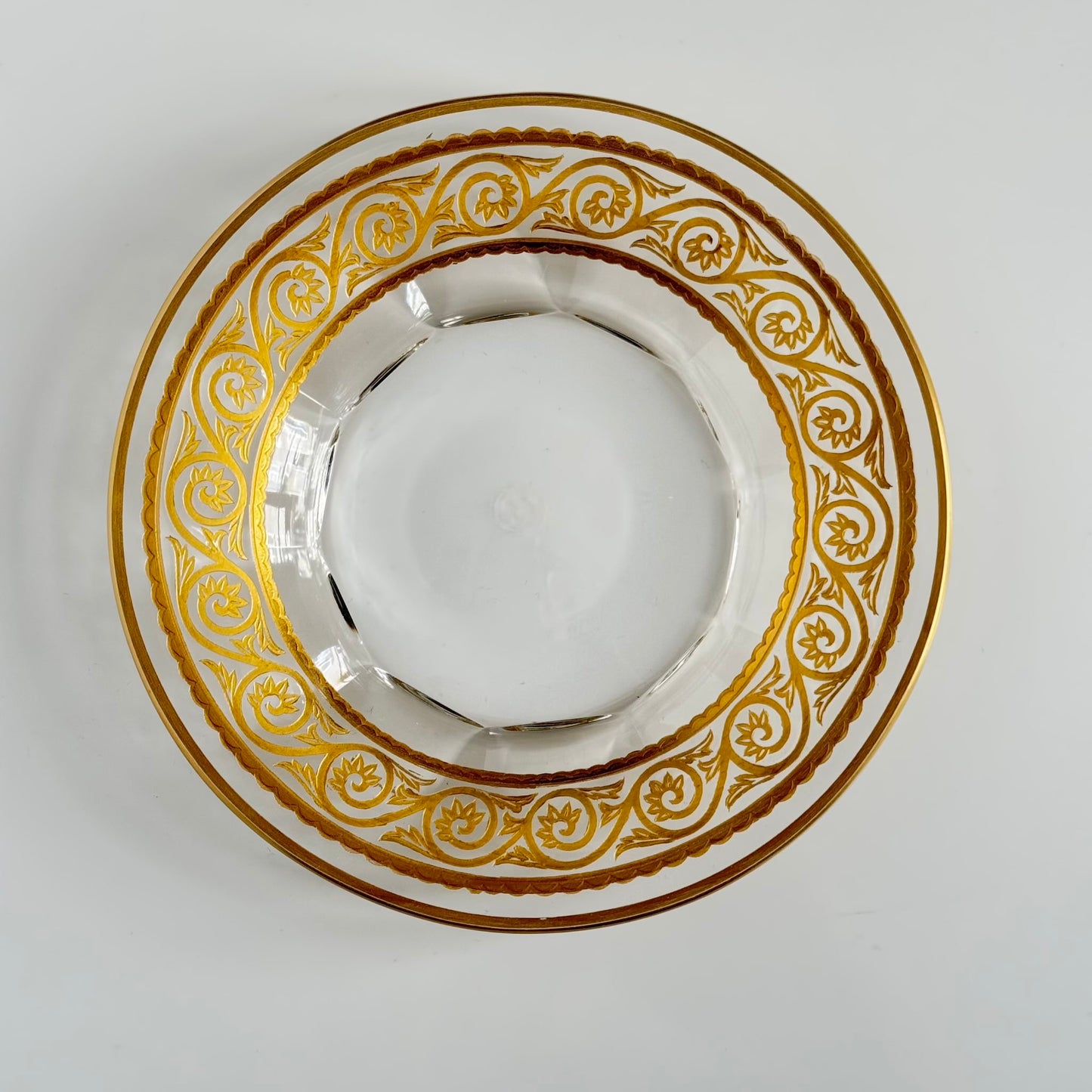 Baccarat crystal vide-poche (trinket dish) featuring a rich gold arabesque border, France.