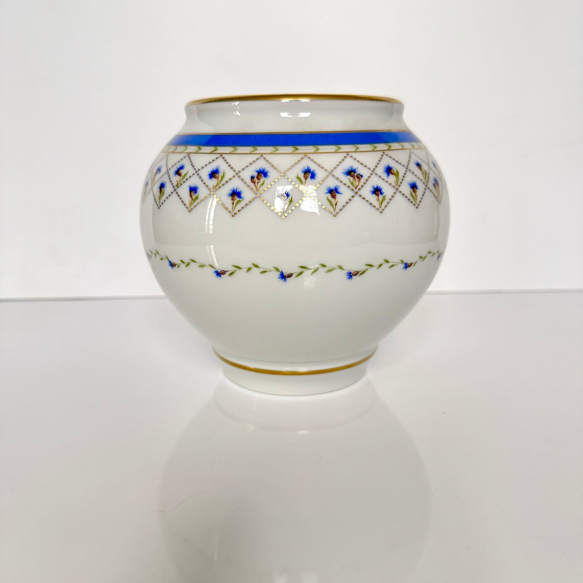 Haviland Limoges porcelain ball vase, Val de Loire pattern with cornflowers and gold points, France.
