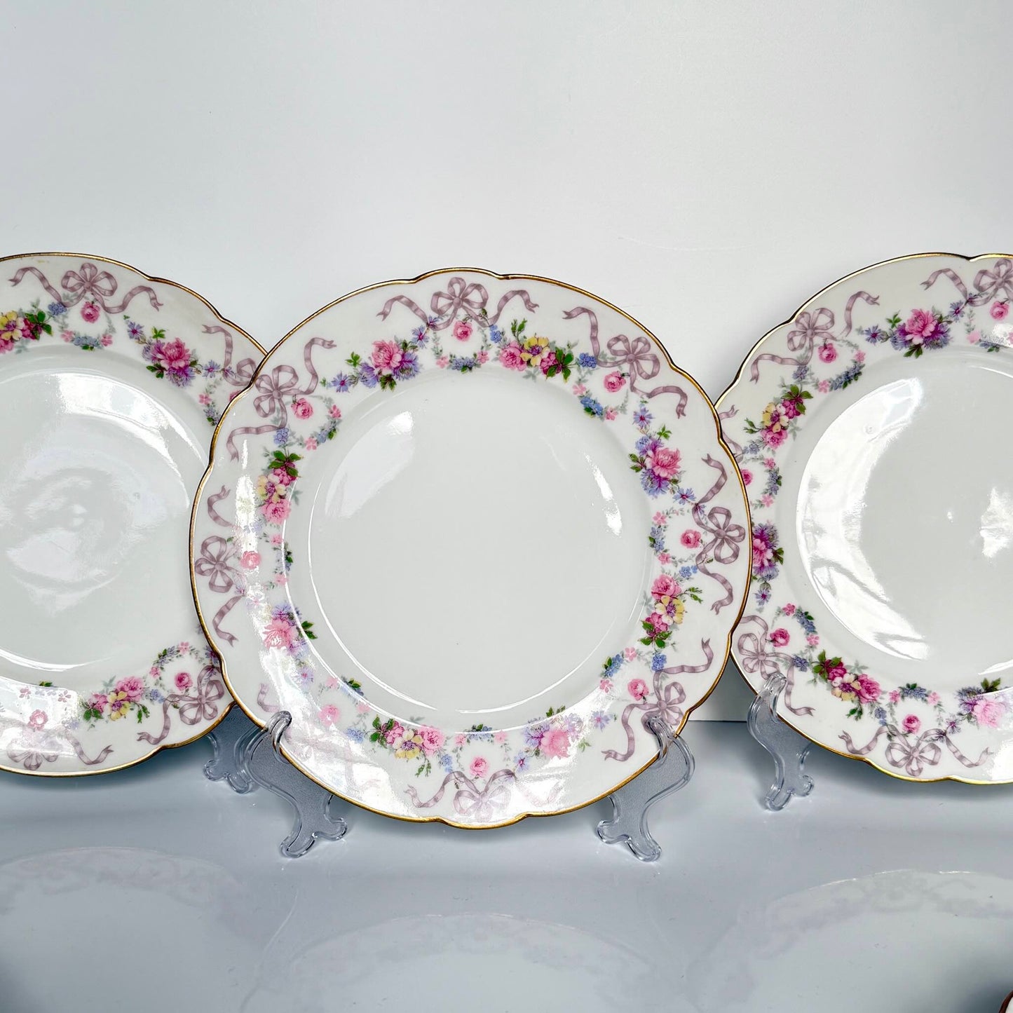 Limoges porcelain dessert plate with floral garland and ribbon decoration, D&C “Old Bernardaud”, late 19th century