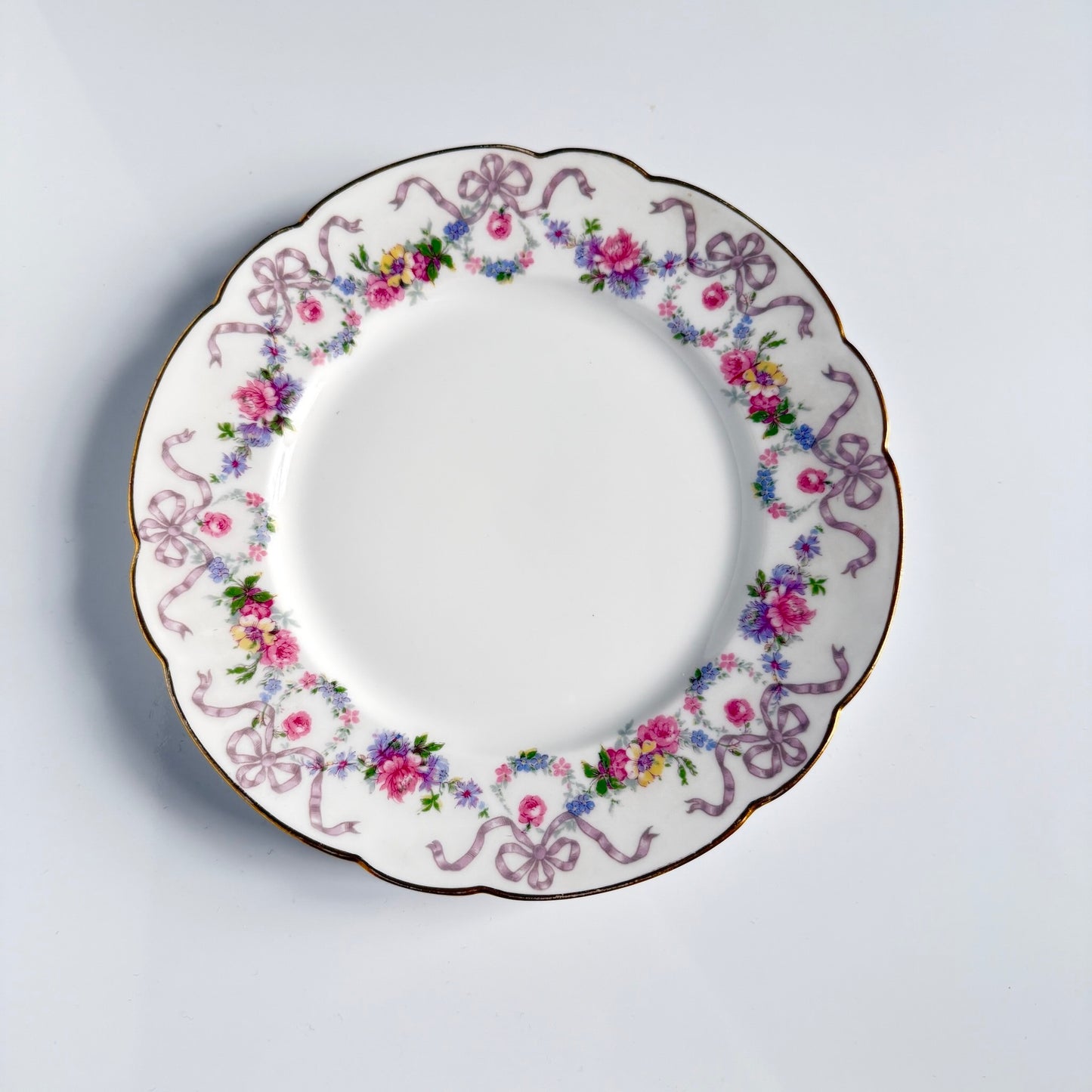 Limoges porcelain dessert plate with floral garland and ribbon decoration, D&C “Old Bernardaud”, late 19th century