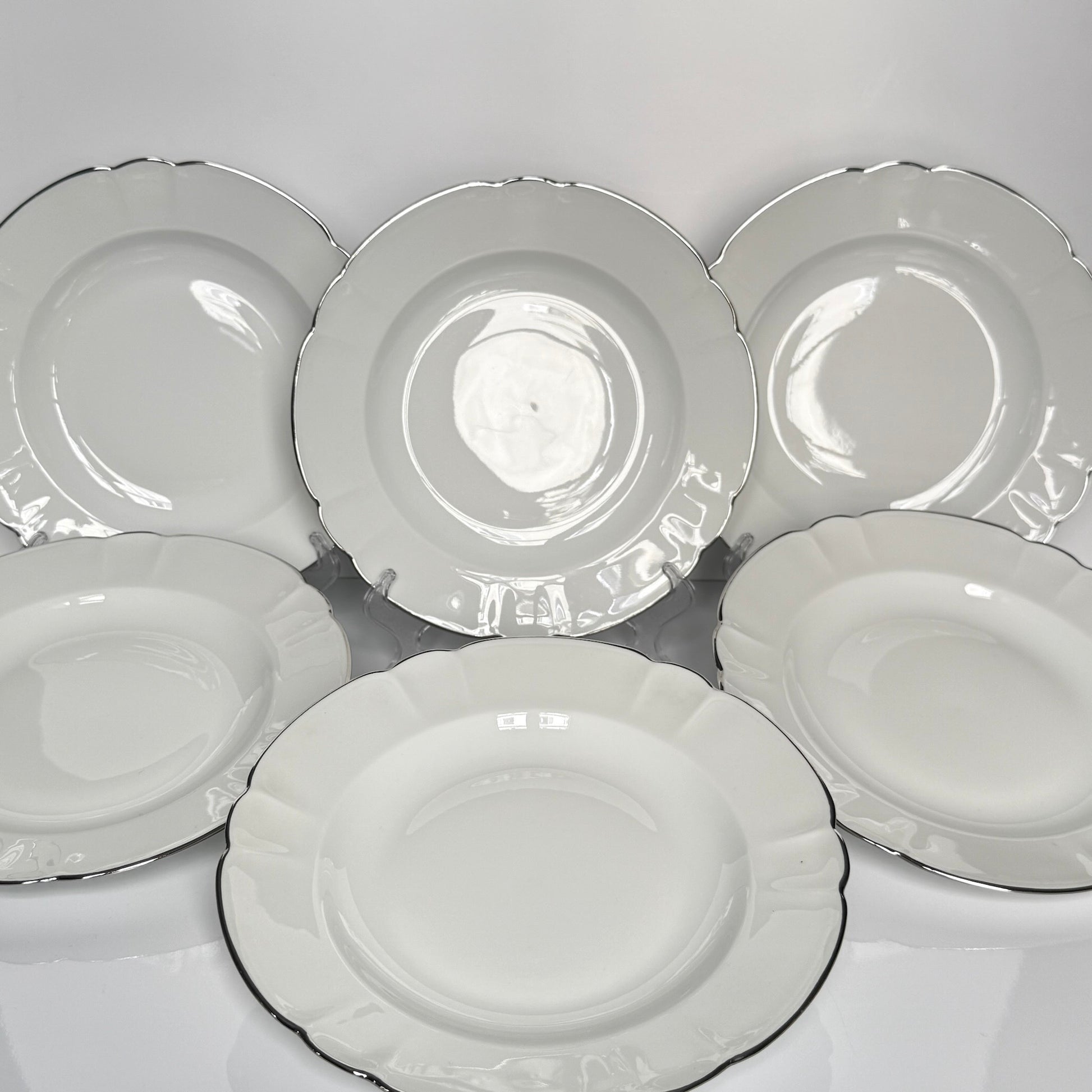 Set of six Limoges white porcelain soup plates with platinum rim by Charles Field Haviland, decorated by Porcelainor Paris, mid-20th century
