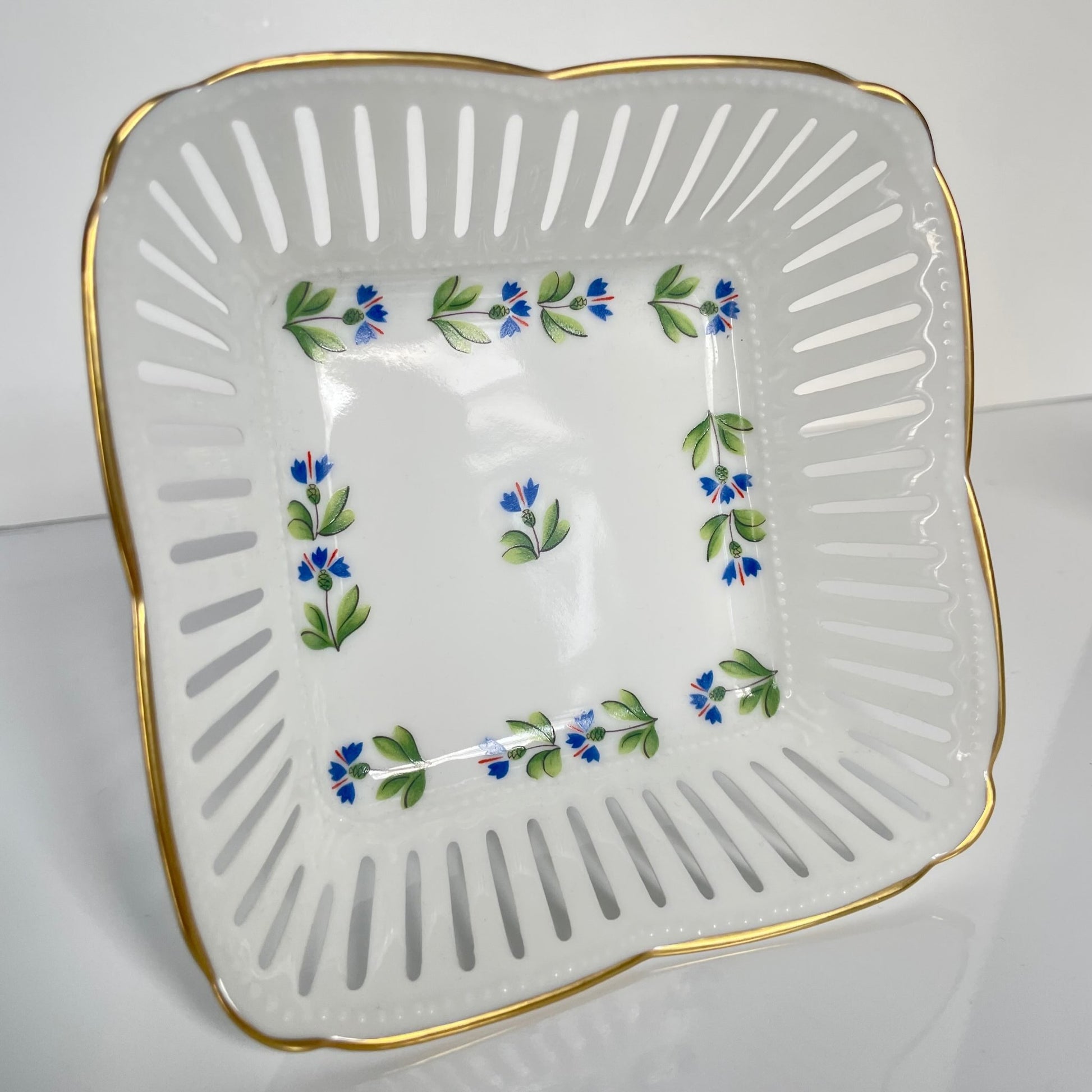 Beautiful porcelain trinket tray by Lys Royal, featuring a cornflower pattern. A limited edition reproduction of an 18th-century design from the Manufacture de la Reine, owned by Marie Antoinette.