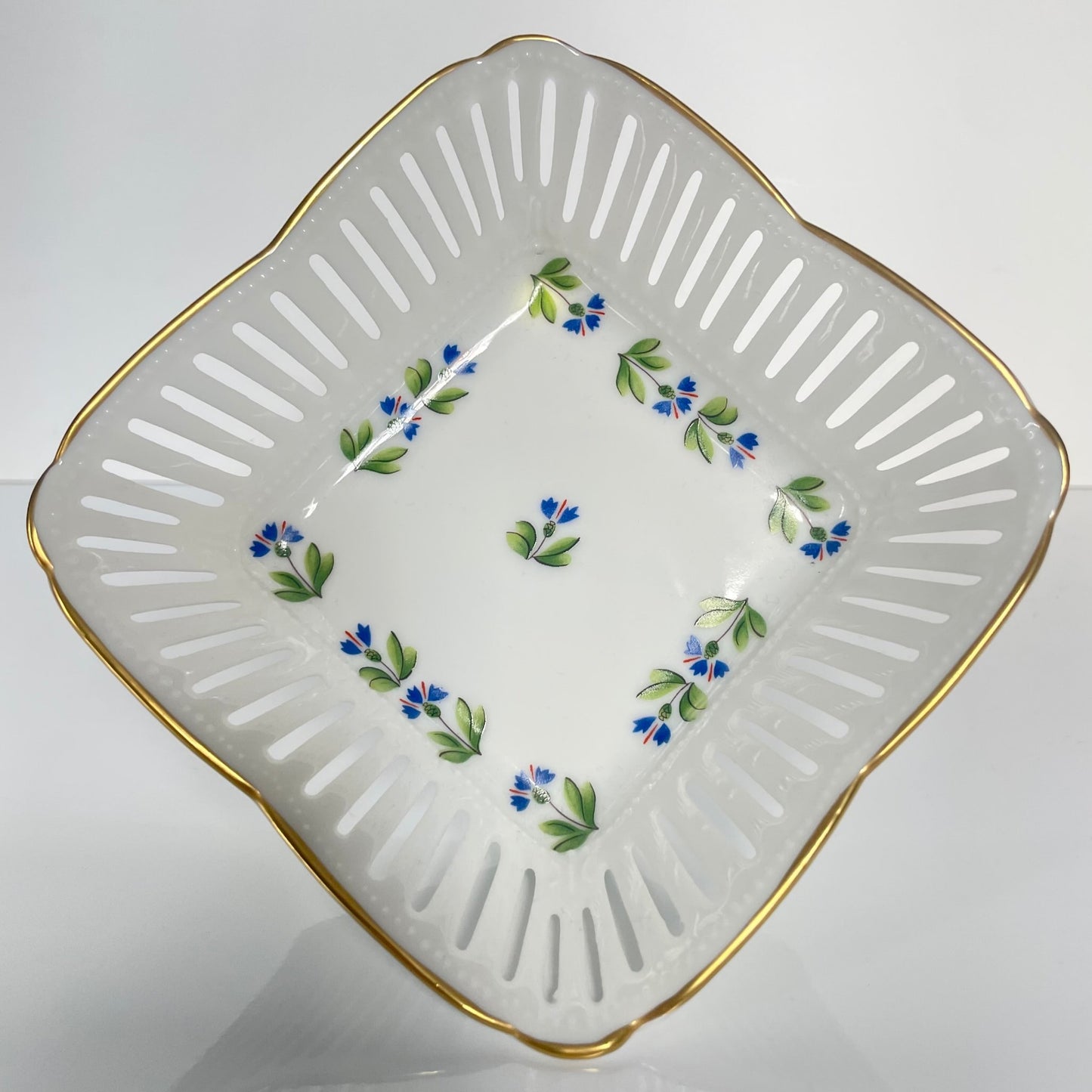 Beautiful porcelain trinket tray by Lys Royal, featuring a cornflower pattern. A limited edition reproduction of an 18th-century design from the Manufacture de la Reine, owned by Marie Antoinette.