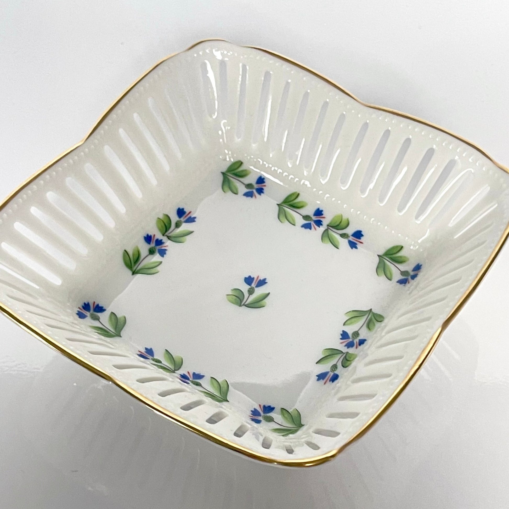 Beautiful porcelain trinket tray by Lys Royal, featuring a cornflower pattern. A limited edition reproduction of an 18th-century design from the Manufacture de la Reine, owned by Marie Antoinette.