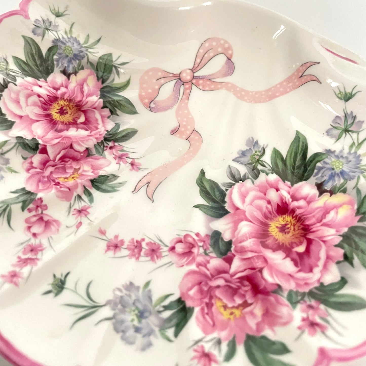 St George porcelain trinket tray with pink shell motif, ribbons, and floral accents. Perfect for small items or display.