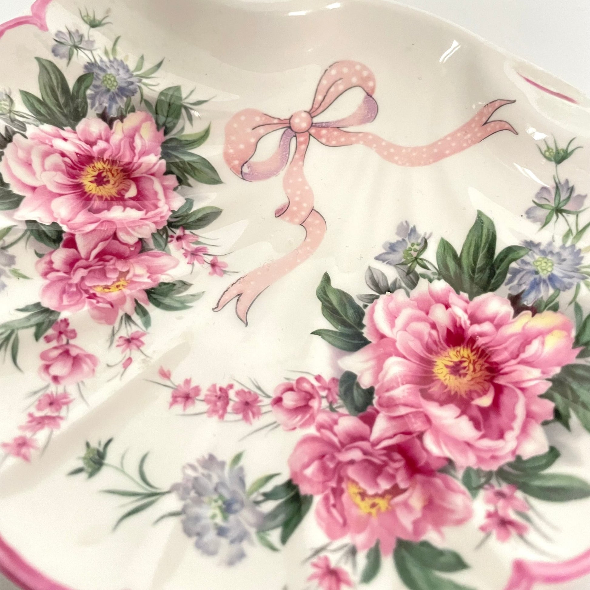 St George porcelain trinket tray with pink shell motif, ribbons, and floral accents. Perfect for small items or display.