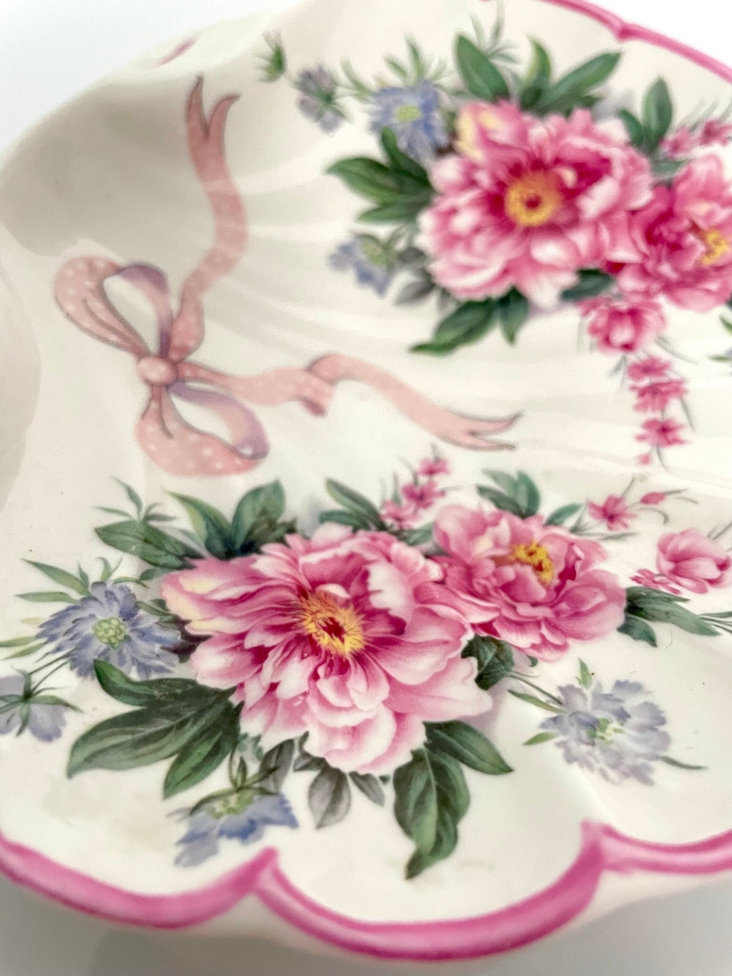 St George porcelain trinket tray with pink shell motif, ribbons, and floral accents. Perfect for small items or display.