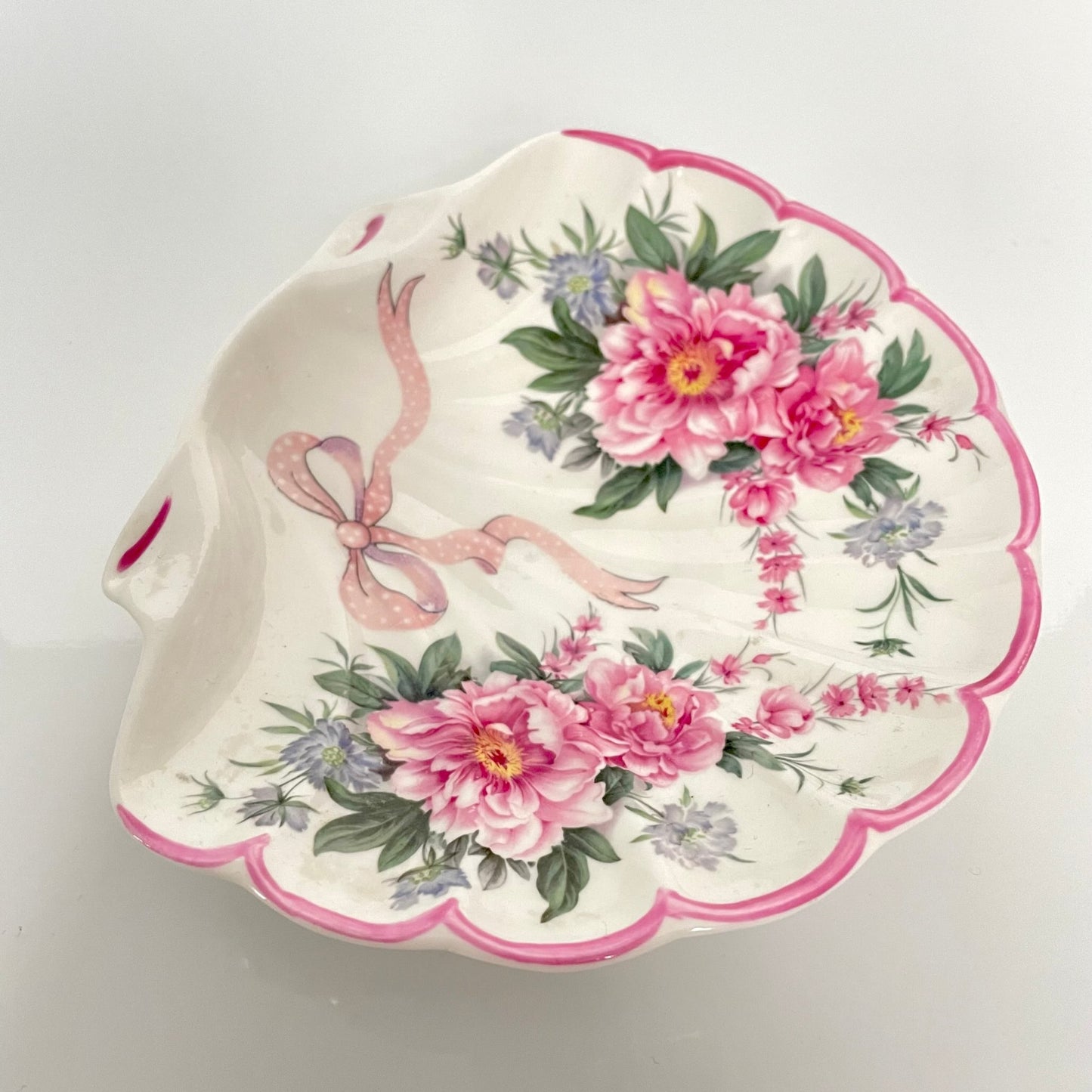 St George porcelain trinket tray with pink shell motif, ribbons, and floral accents. Perfect for small items or display.