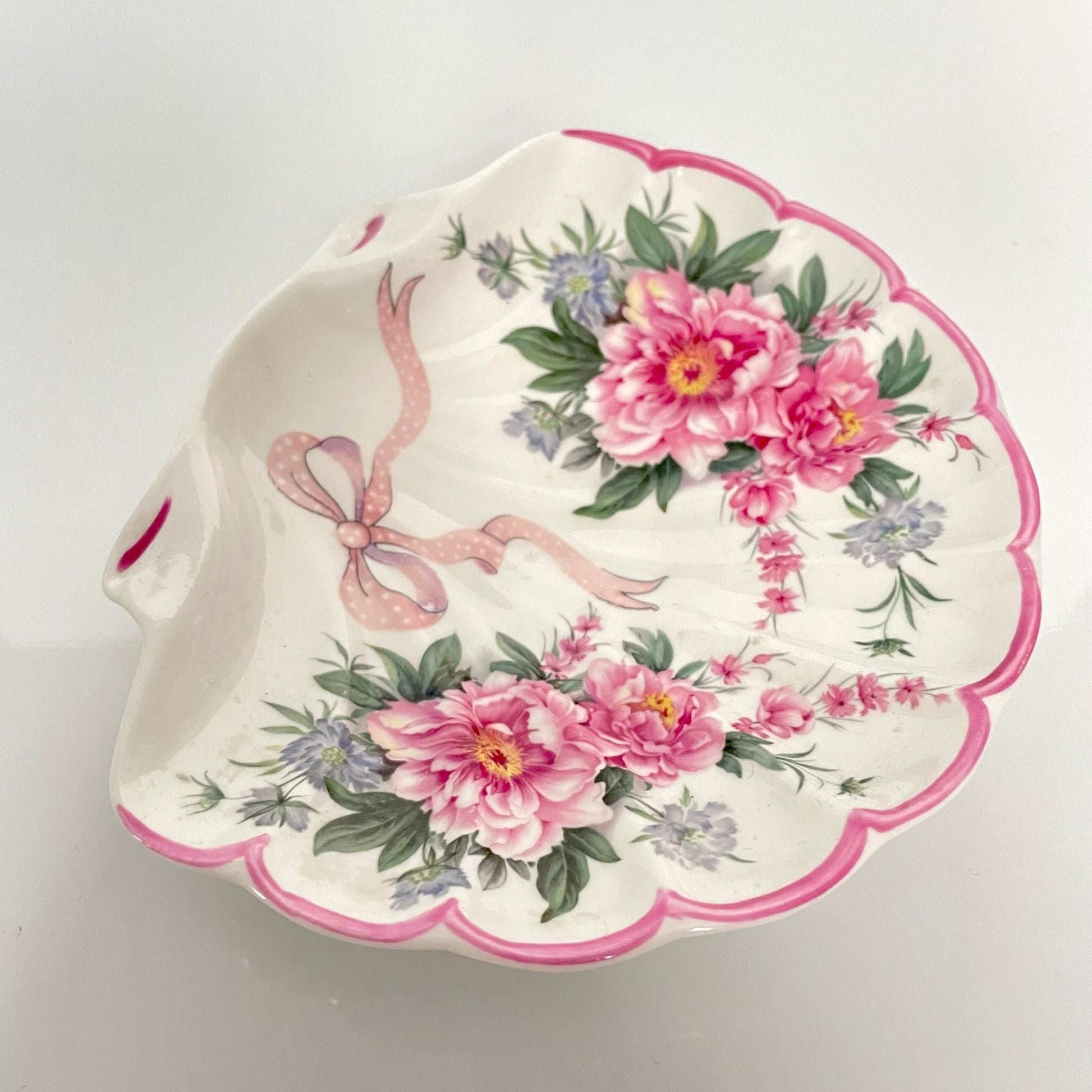 St George porcelain trinket tray with pink shell motif, ribbons, and floral accents. Perfect for small items or display.