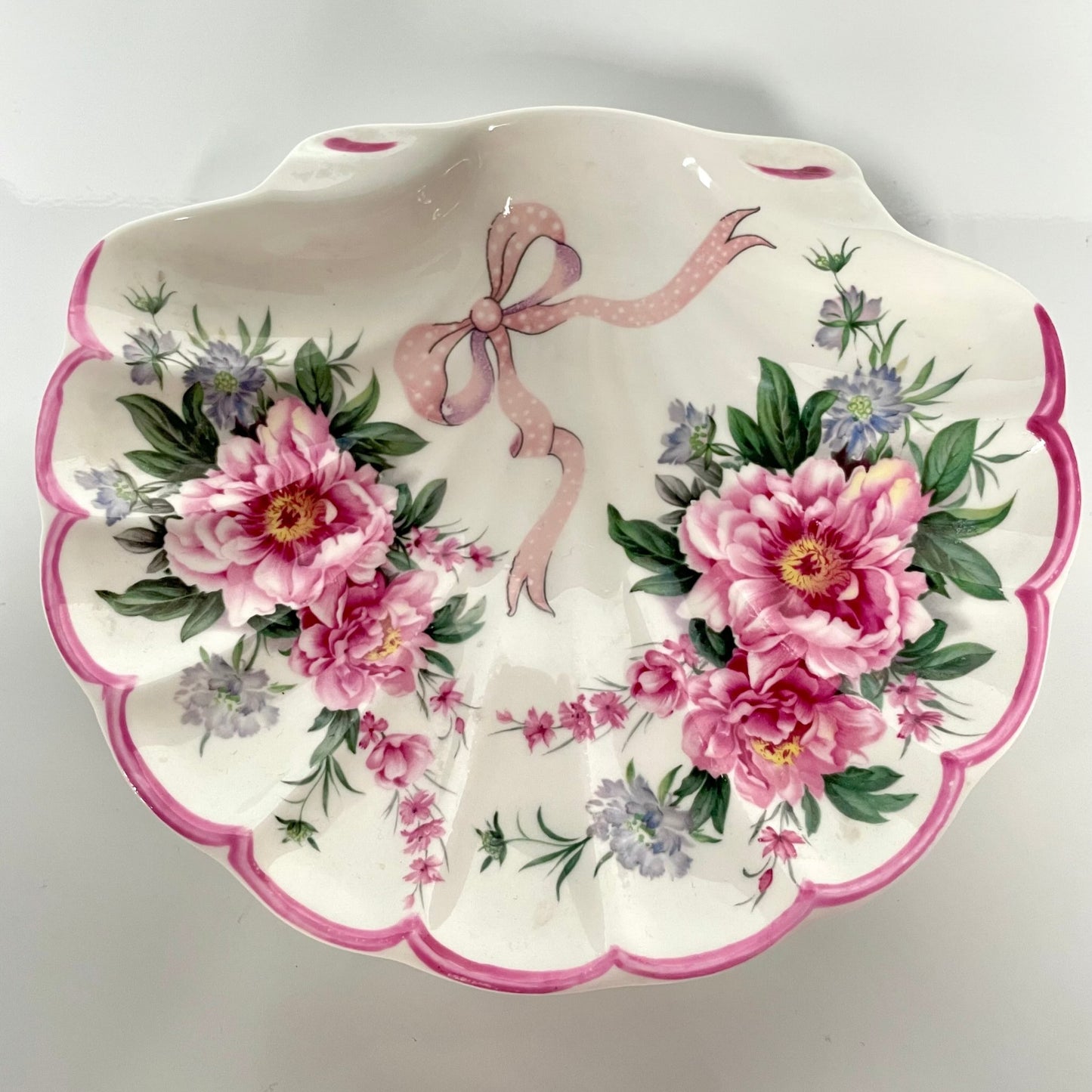 St George porcelain trinket tray with pink shell motif, ribbons, and floral accents. Perfect for small items or display.
