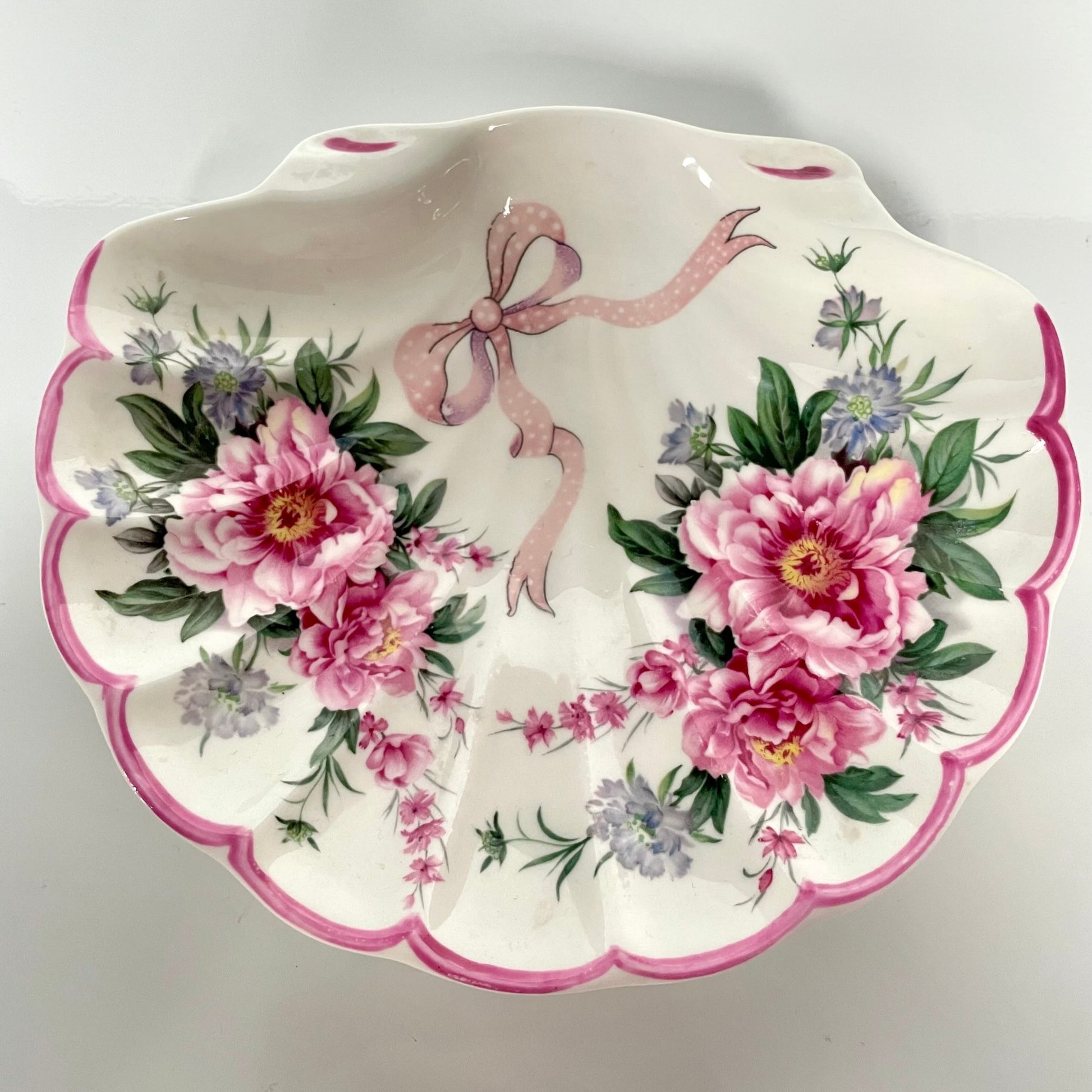 St George porcelain trinket tray with pink shell motif, ribbons, and floral accents. Perfect for small items or display.