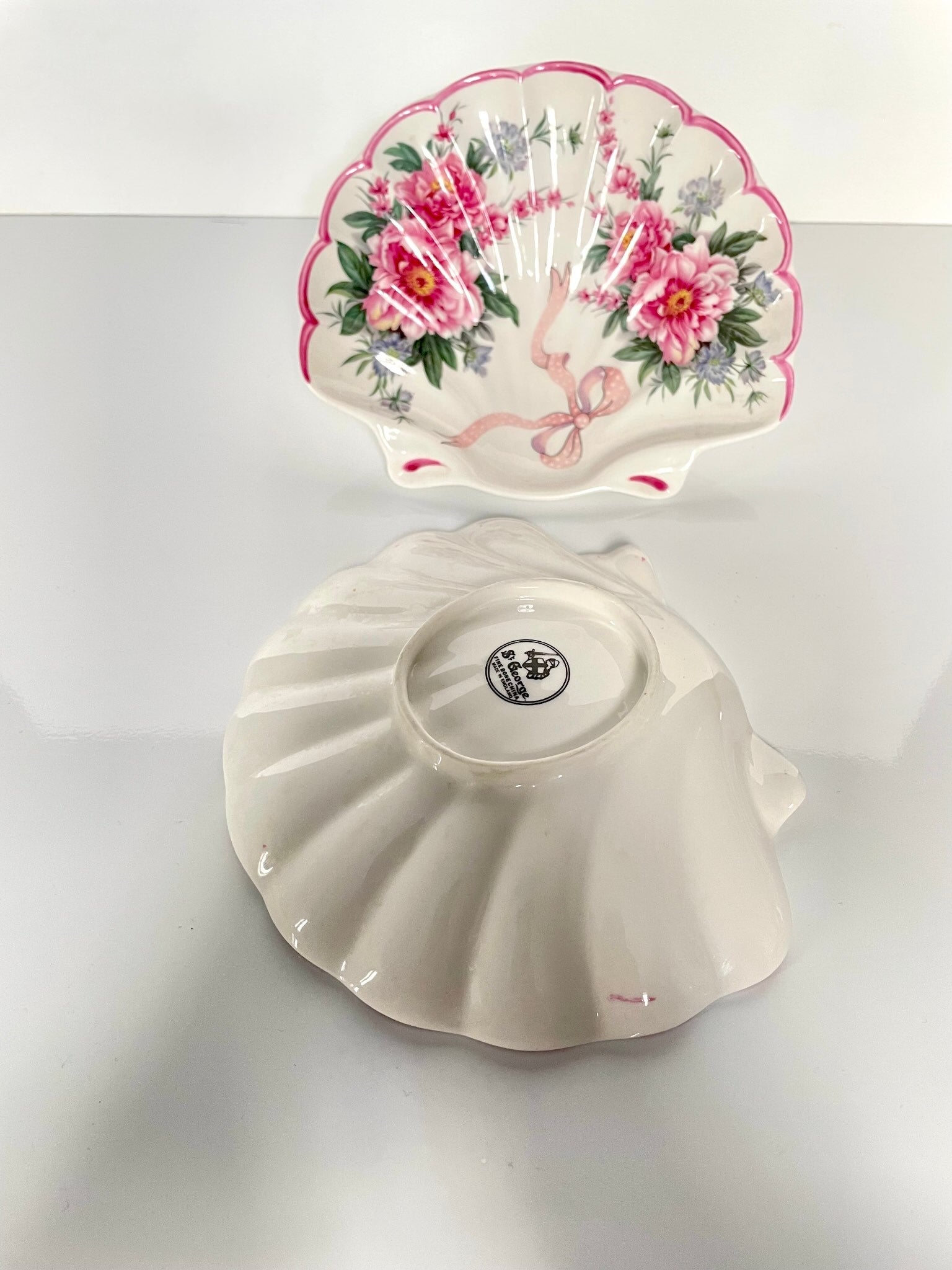 St George porcelain trinket tray with pink shell motif, ribbons, and floral accents. Perfect for small items or display.