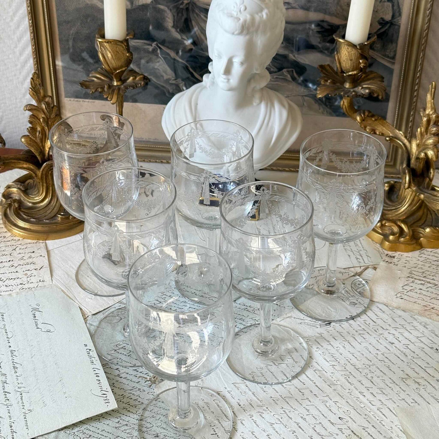 Vintage French acid-etched stemmed glass decorated with ribbon motifs and rose garlands, 20th century.