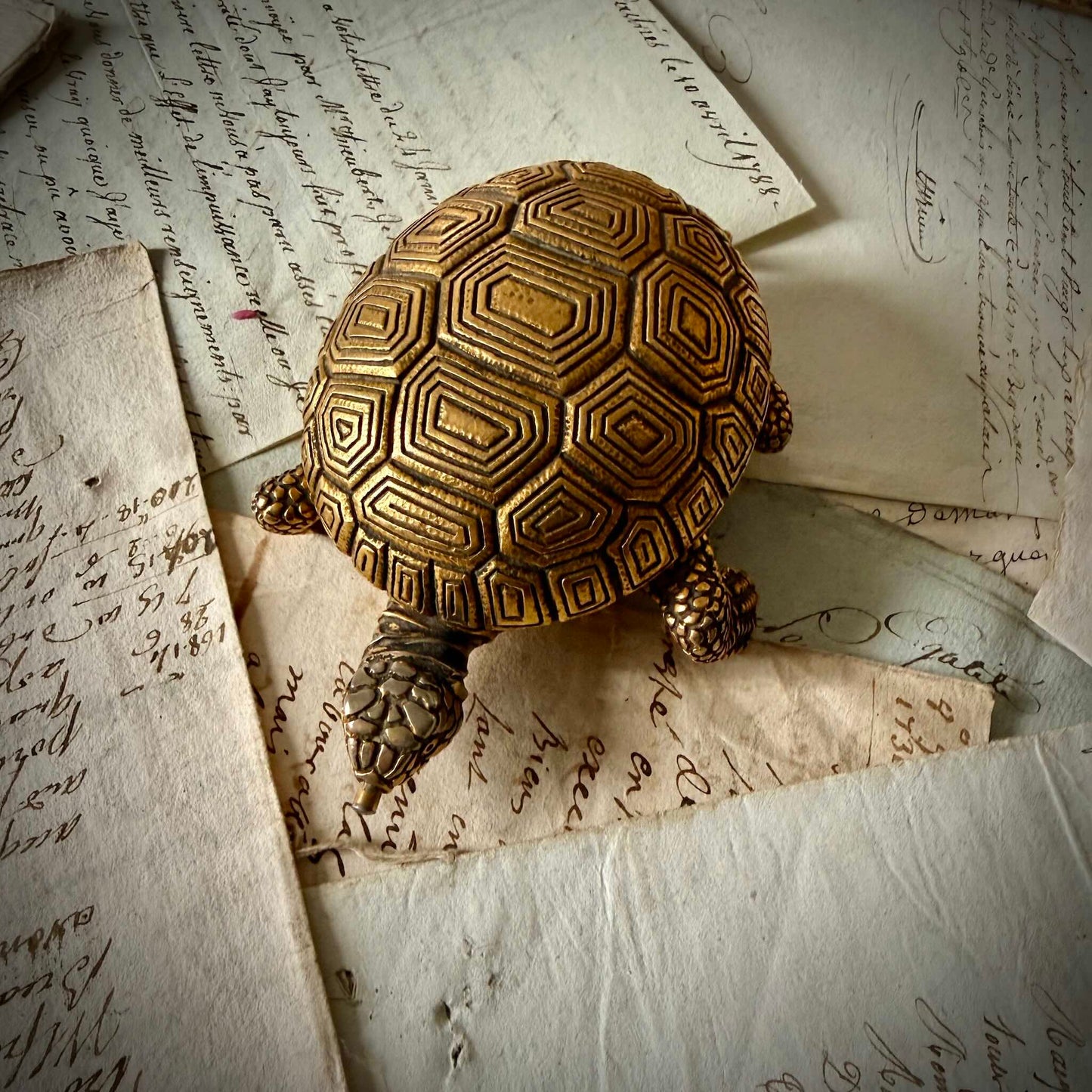 Vintage Lancel gilded bronze turtle-shaped alarm clock, carapace open revealing dial, circa 1950 France.