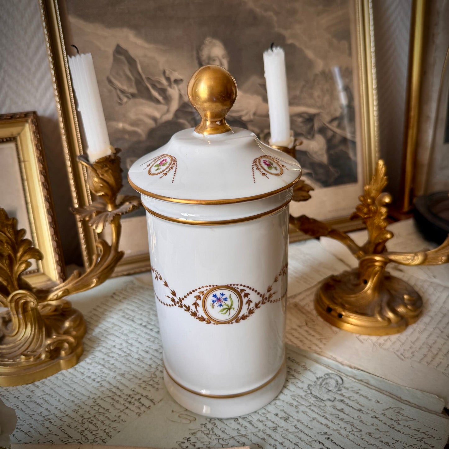 Vintage Limoges Castel porcelain apothecary jar with lid, decorated with floral medallions and gold scrolls, France.