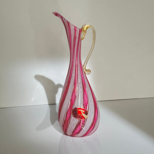 Vintage Murano glass ewer vase featuring pink and white latticino filigree patterns, mid-20th century Italy.