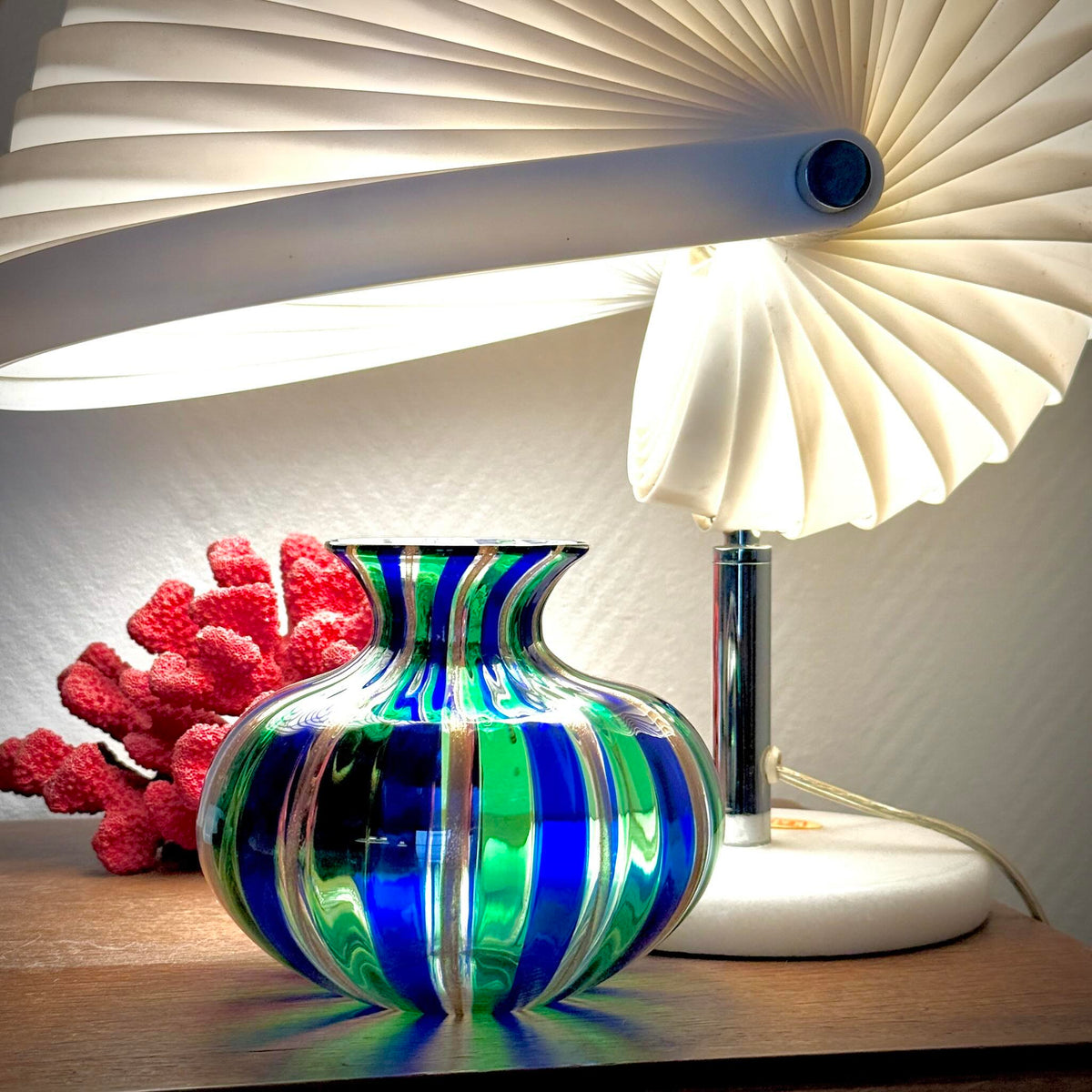 Vintage Murano blown glass vase attributed to Livio Campanella, featuring emerald green, blue, and fine gold flakes.